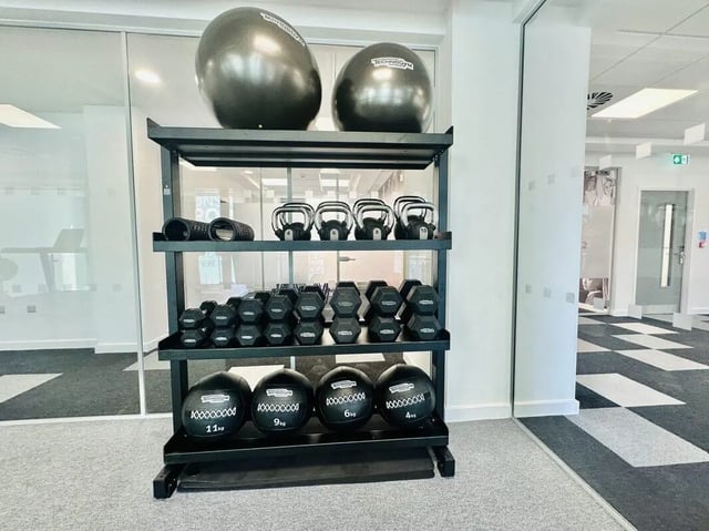 Exercise balls dumbbells kettlebells rack gym area at Albany Student Village in Coventry Student Accommodation