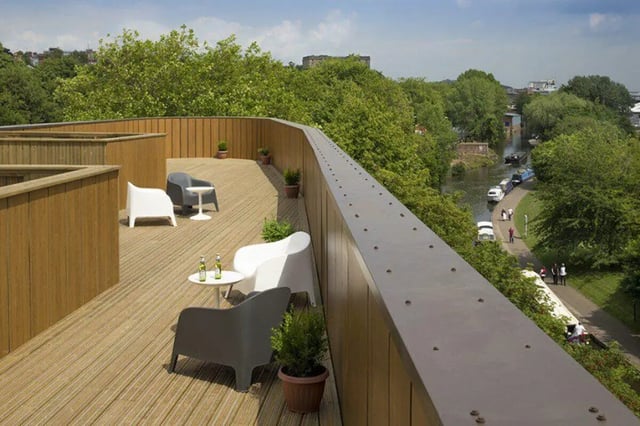Wooden deck chairs tables with drinks exterior at Graystacks in Nottingham Student Accommodation