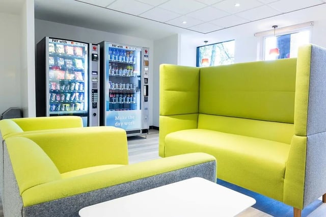 Vending machines and bright sofas communal area at Abbey House in Coventry Student Accommodation