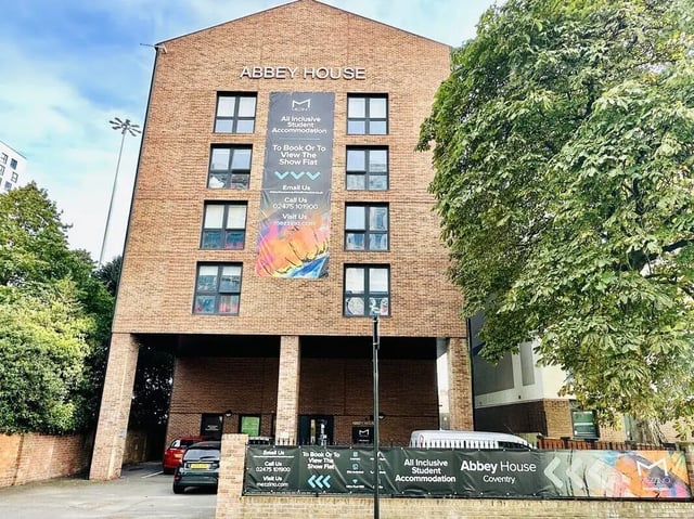 Abbey House student accommodation exterior with banners at Abbey House in Coventry Student Accommodation