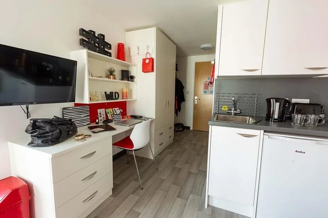 Desk TV kettle sink and wardrobe student studio at Julian Court in Coventry Student Accommodation
