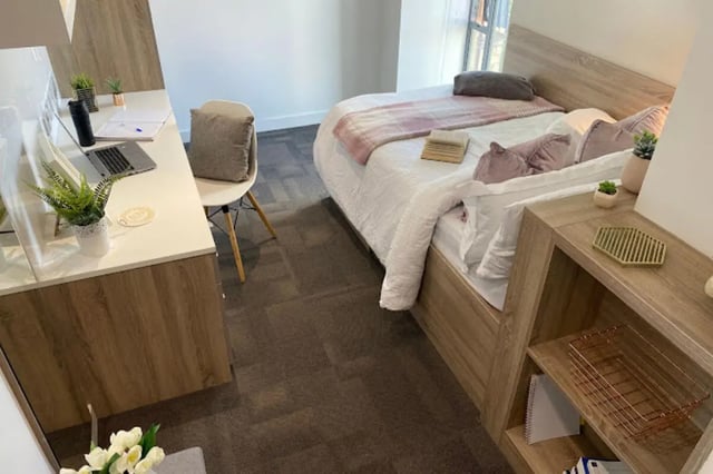 Desk chair laptop bed and shelves bedroom at CityBlock Penny Street in Lancaster Student Accommodation