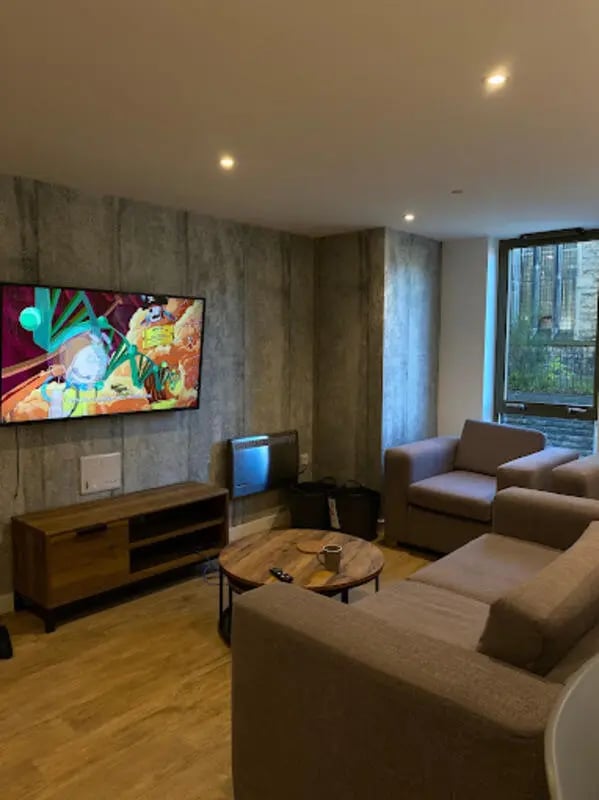 Sofa television coffee table living room at CityBlock Marton Street in Lancaster Student Accommodation