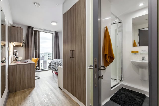 Desk bed and shower ensuite bathroom at Kaplan Living Liverpool in Liverpool Student Accommodation
