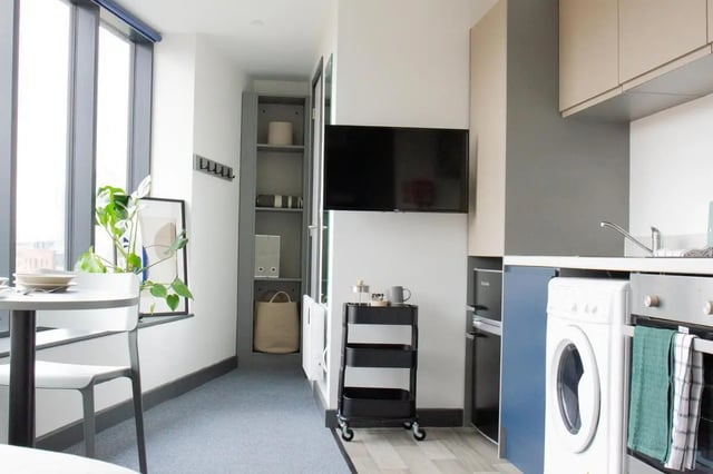Modern studio with kitchen, TV, storage, and desk Kitchen at Trapezium in Leeds Student Accommodation