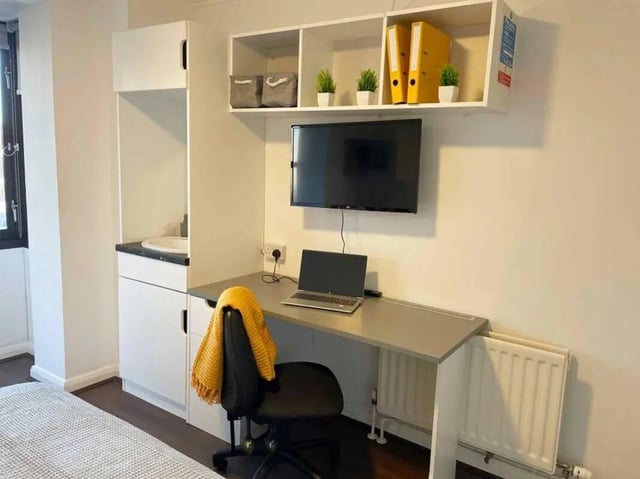 Desk TV chair sink and radiator study area at Hockley Point in Nottingham Student Accommodation