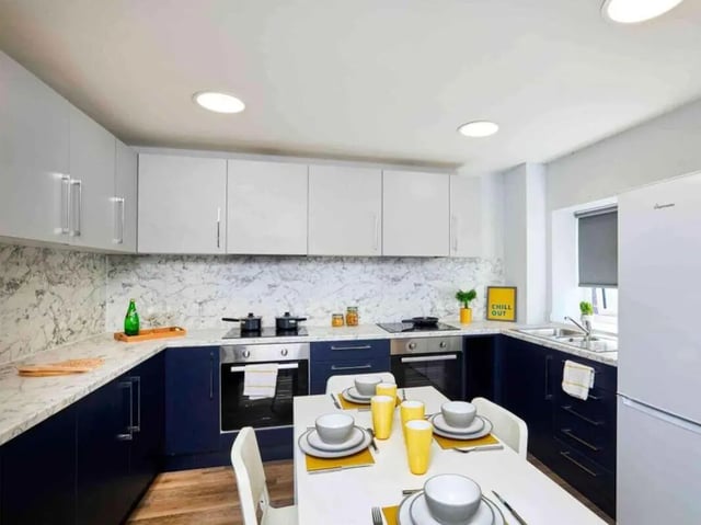 Modern kitchen with dining table and appliances kitchen at Hockley Point in Nottingham Student Accommodation