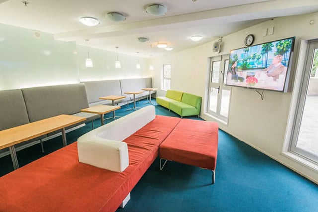 Lounge seating television and tables common area at The Collective at Columbia Apartments in Columbia Student Accommodation