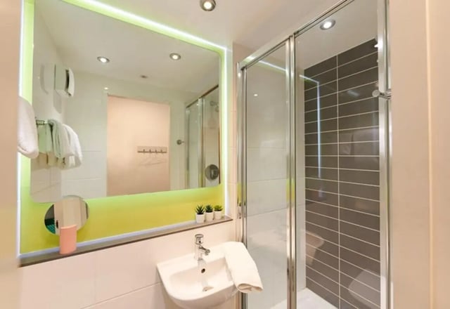 Sink mirror shower with toiletries bathroom at Binary Hub in Dublin Student Accommodation
