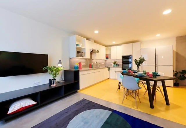 Modern kitchen dining area with appliances living room at Dorset Point in Dublin Student Accommodation
