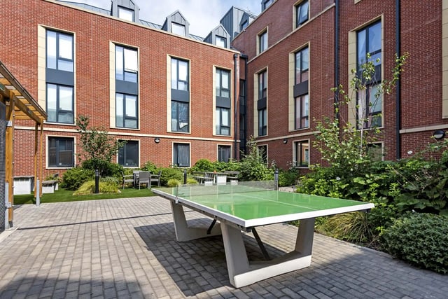 Ping pong table in courtyard outside building exterior at Sycamore House in Leeds Student Accommodation