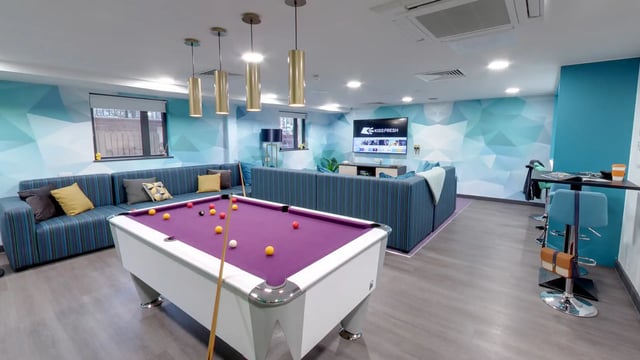 Pool table lounge sofa TV area at Sycamore House in Leeds Student Accommodation