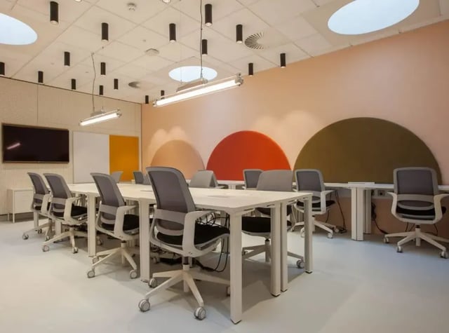Desks chairs and screen in modern study area at Highlight Parkgate in Dublin Student Accommodation