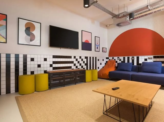 Sofa beanbag TV yellow stools living room at Highlight Parkgate in Dublin Student Accommodation