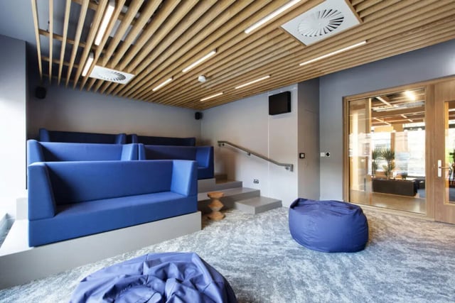 Blue tiered seating beanbags carpeted lounge area at Cork Street Residence in Dublin Student Accommodation
