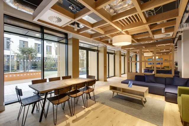 Dining table with chairs and lounge area Living Room at Cork Street Residence in Dublin Student Accommodation