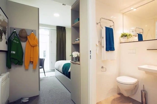 Coats and bed with bathroom and toilet. Bedroom bathroom at Liv Dublin in Dublin Student Accommodation