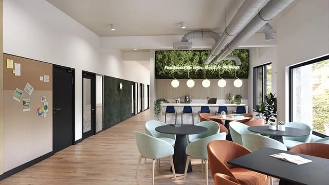 Seating area with tables and chairs common room at Ashlin House in Cork Student Accommodation