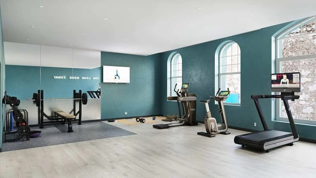 Treadmill elliptical bike weight bench gym at Broga House in Cork Student Accommodation