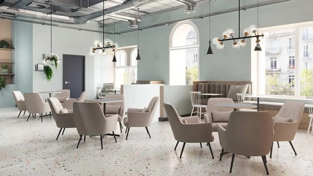 Comfortable chairs tables and banquette seating lounge at Broga House in Cork Student Accommodation