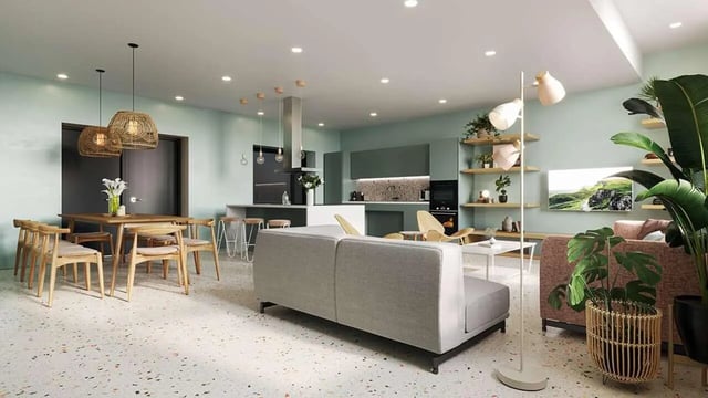 Dining table sofas kitchen plants living room at Broga House in Cork Student Accommodation
