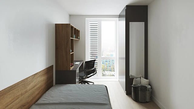 Bed desk chair shelves mirror basket bedroom at Broga House in Cork Student Accommodation