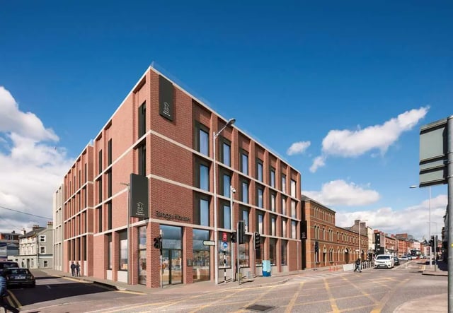 Red brick student accommodation building exterior. at Broga House in Cork Student Accommodation