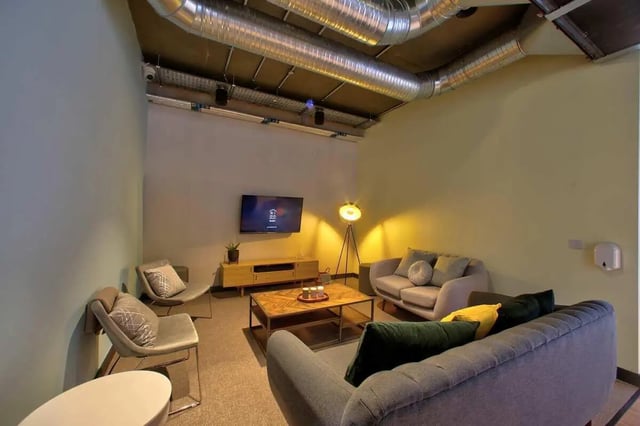 Sofas coffee table TV chairs living room at Curraheen Point in Cork Student Accommodation