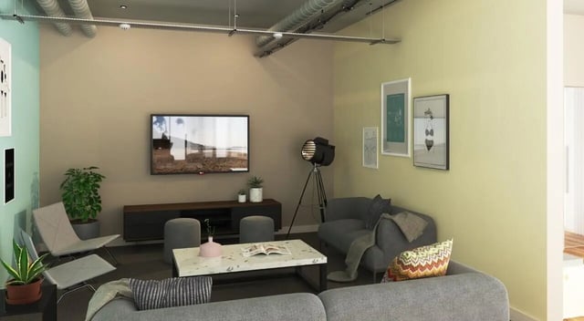 Modern living room with sofas television and coffee table living room at Curraheen Point in Cork Student Accommodation