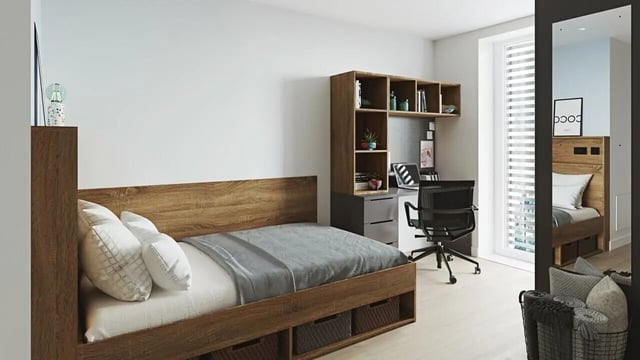 Wooden bed desk shelves chair and laptop bedroom at Ardee Point in Dublin Student Accommodation