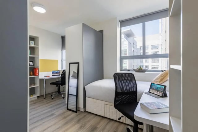Bed desk chair mirror shelving unit bedroom at Mayor Square in Dublin Student Accommodation