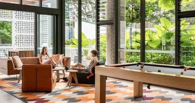 Pool table and lounge seating living room at Iglu Brisbane City in Brisbane Student Accommodation