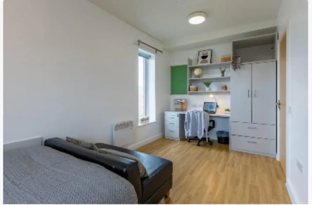 Desk wardrobe and bed bedroom at The Maltings in Colchester Student Accommodation