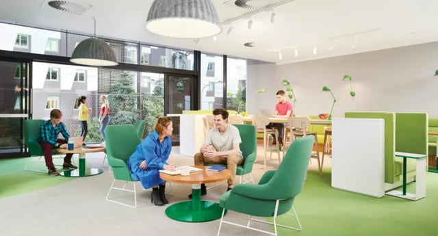 Modern lounge with green chairs and study desks lounge area at Scape South Bank in Brisbane Student Accommodation