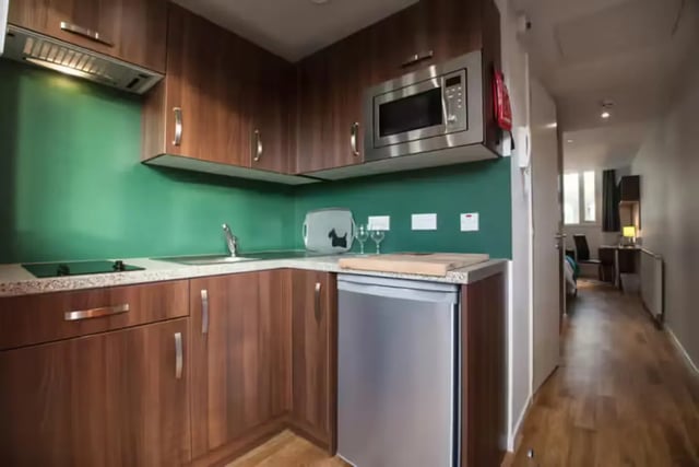 Kitchen cabinets sink microwave and fridge kitchen at Centro Court in Aberdeen Student Accommodation