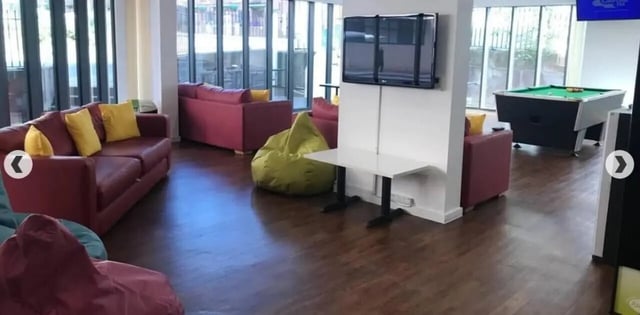 Sofas beanbags pool table TV living room at Grenville Street in Liverpool Student Accommodation