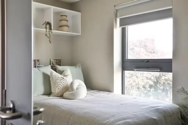 Bed pillows shelf and window bedroom at Talbot Point in Nottingham Student Accommodation
