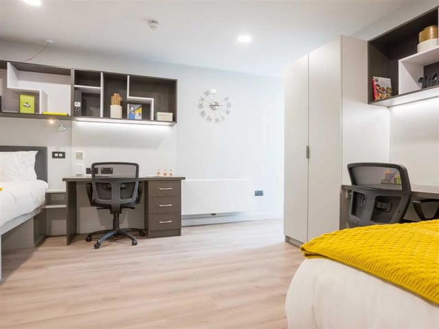 Bed desks shelves and chairs bedroom living room at Brickworks in Dublin Student Accommodation