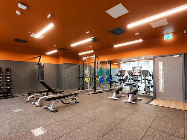 Gym equipment with weights and benches gym at Brickworks in Dublin Student Accommodation