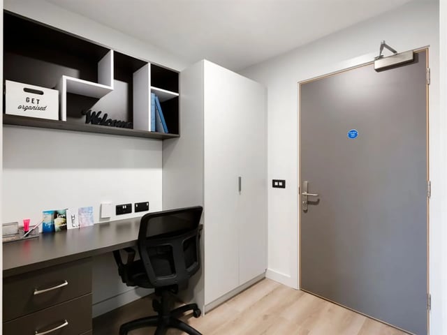 Desk chair shelves and wardrobe study area at Brickworks in Dublin Student Accommodation