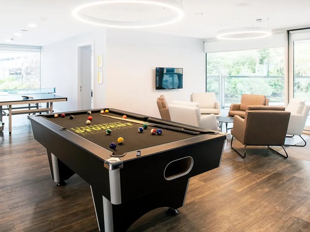 Pool table ping pong table lounge area living room at Amnis House in Cork Student Accommodation