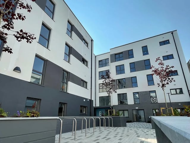 Modern student accommodation building with bike racks exterior at Melbourn Point in Cork Student Accommodation