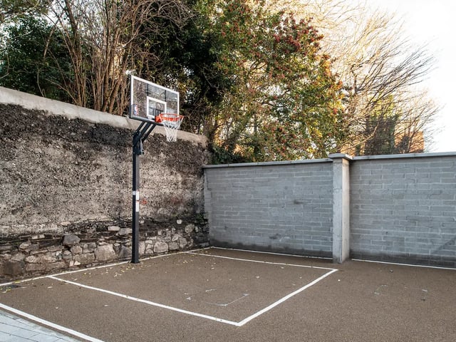 Basketball hoop on court exterior playing area at Ardcairn House in Dublin Student Accommodation