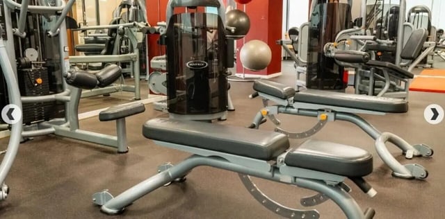 Workout machines and benches gym area at Marybone Student Village 3 in Liverpool Student Accommodation