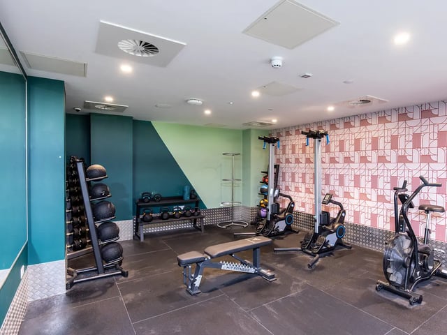 Dumbbells rowers bench weights playing area at Brewers Close in Dublin Student Accommodation
