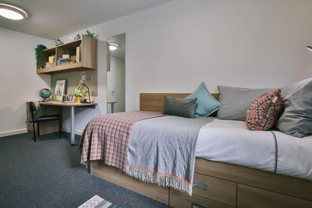 Bed desk chair shelves mirror bedroom at Victoria Court in Lancaster Student Accommodation