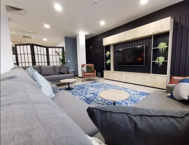 Comfortable seating and tv unit lounge at Little Patrick Street in Belfast Student Accommodation