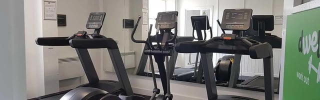 Gym equipment with treadmills and elliptical Image Type gym at Garth Heads in Newcastle Upon Tyne Student Accommodation