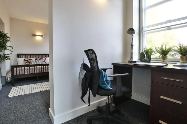 Desk with plants and chair Bedroom living room at Dean Clarke Lofts in Exeter Student Accommodation