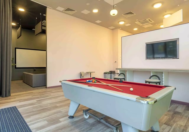 Pool table with balls and cues lounge area Image Type at iQ Astor House in Plymouth Student Accommodation